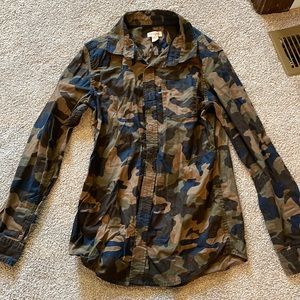 It’s a camo shirt button up, girls, large